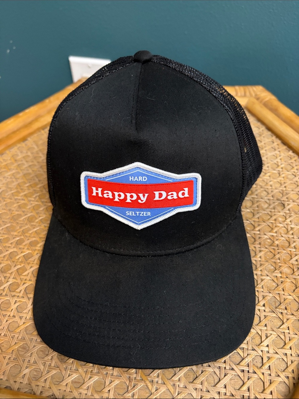 Black Trucker Cap with Branded Patch